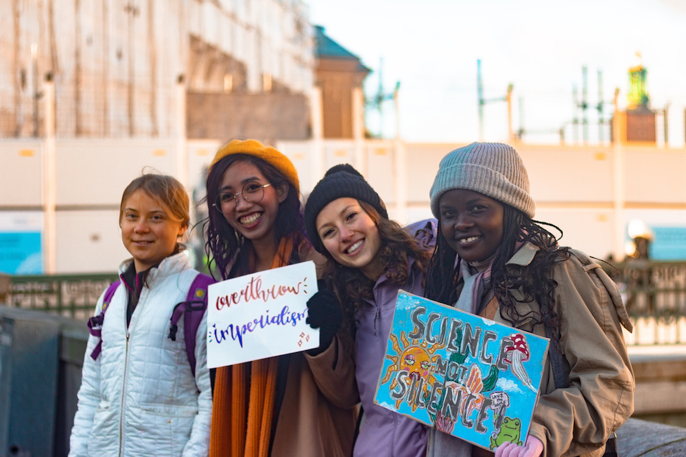 Mitzi Jonelle Tan with other climate justice youth activists